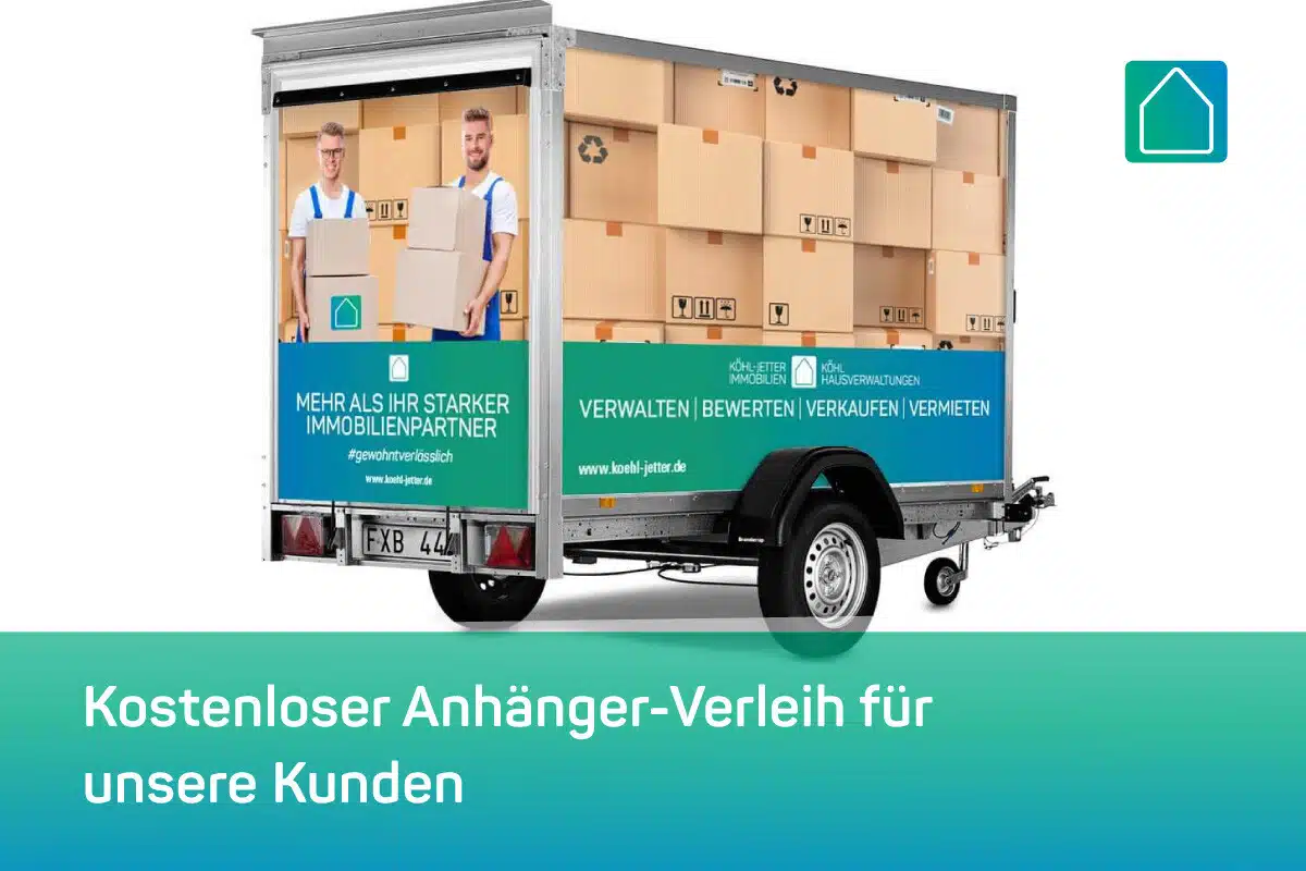Ein kleiner Anhänger mit der Werbung eines Immobilienunternehmens, der zwei Männer mit Kisten zeigt. Die Anzeige lautet: Mehr als Ihr starker Immobilienpartner" und listet Dienstleistungen wie Verwaltung und Verkauf auf. Der Text darunter lautet "Kostenloser Anhänger-Verleih für unsere Kunden".